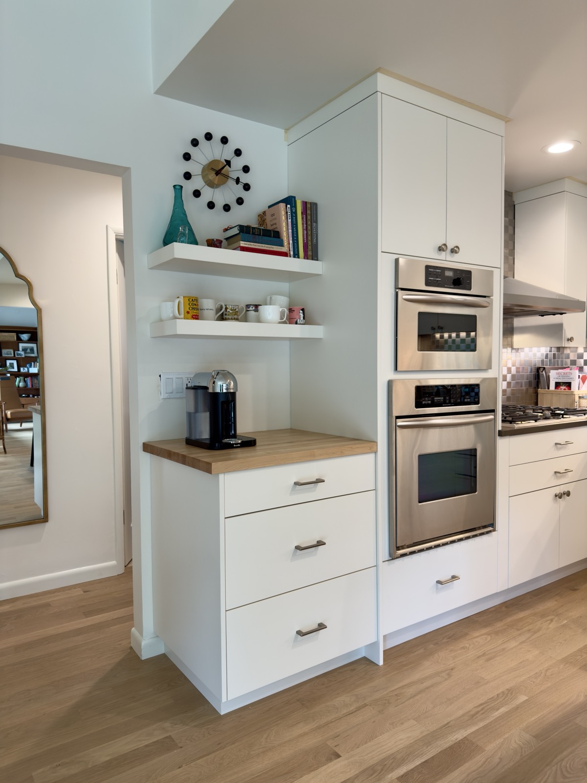 Coordinated maple cabinet addition beside existing cabinetry