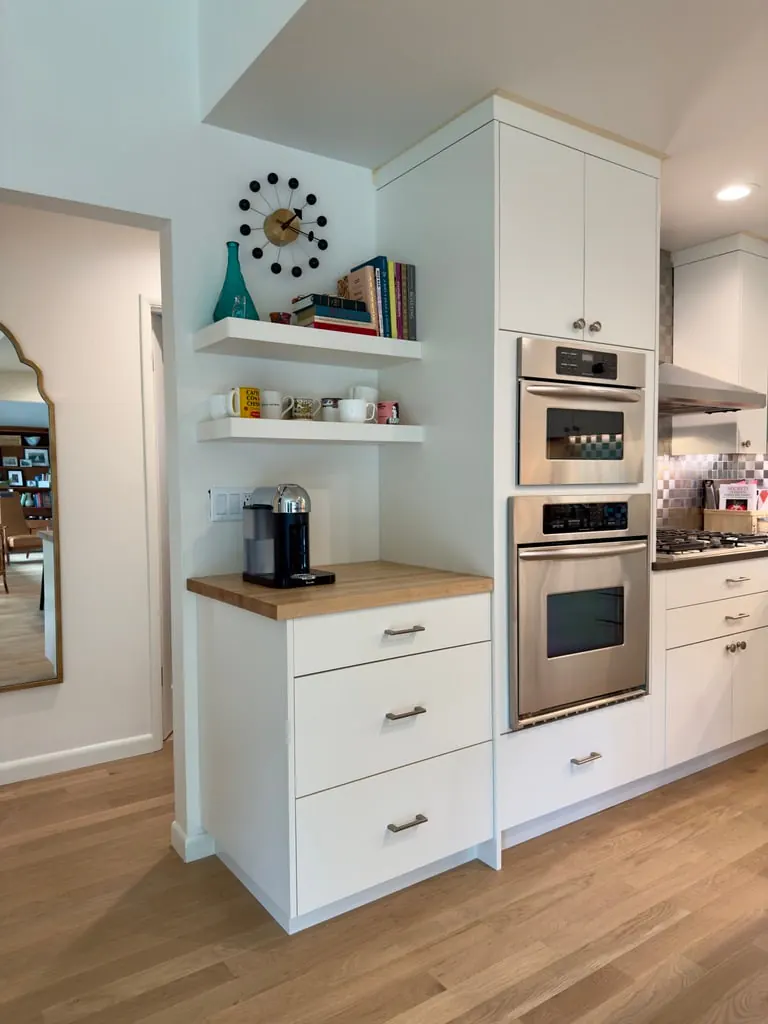 White appliance cabinet and coffee station coordinated with the View Ridge refacing project